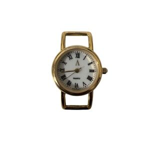 Vintage Avon Gold and White Quartz With a stainless steel back. (NEED BATTERY)